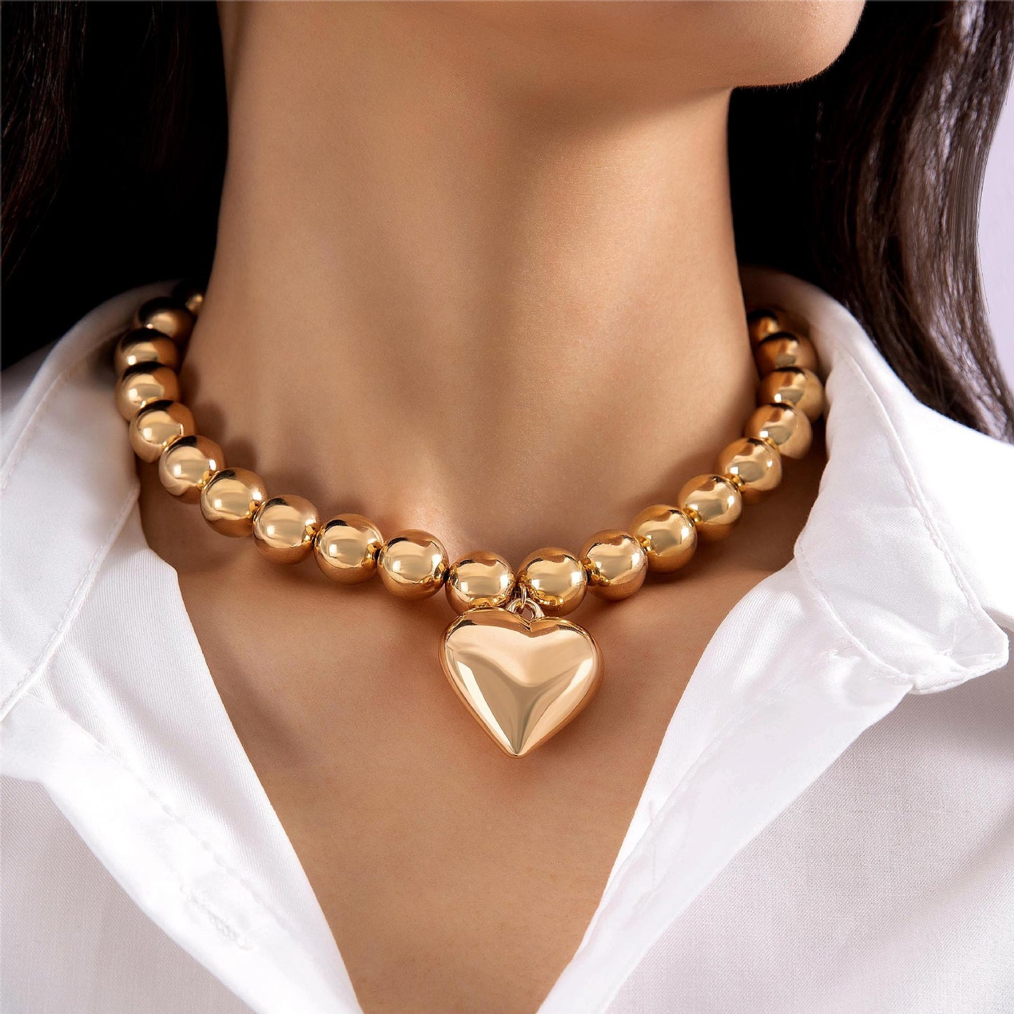 Globe With Heart Necklace