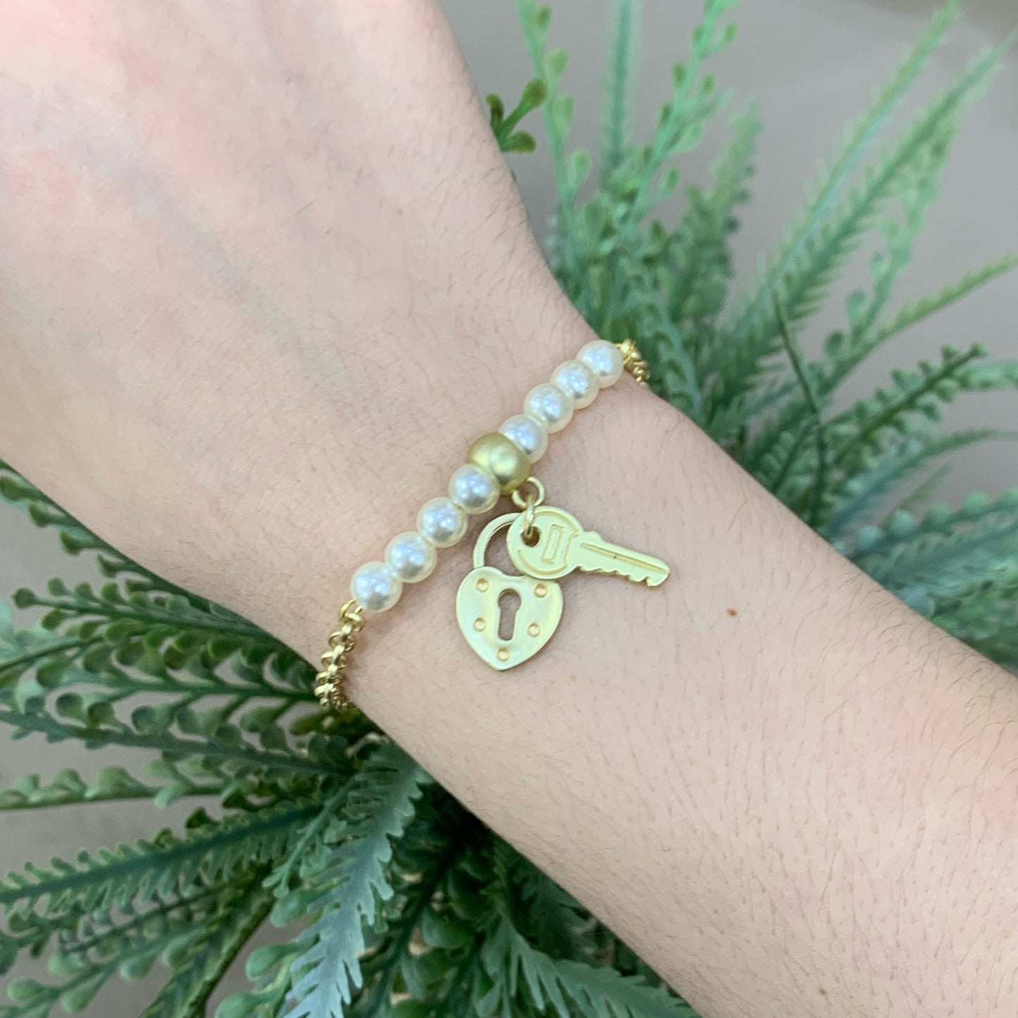 Gold Bracelet With Pearls, Key and Heart