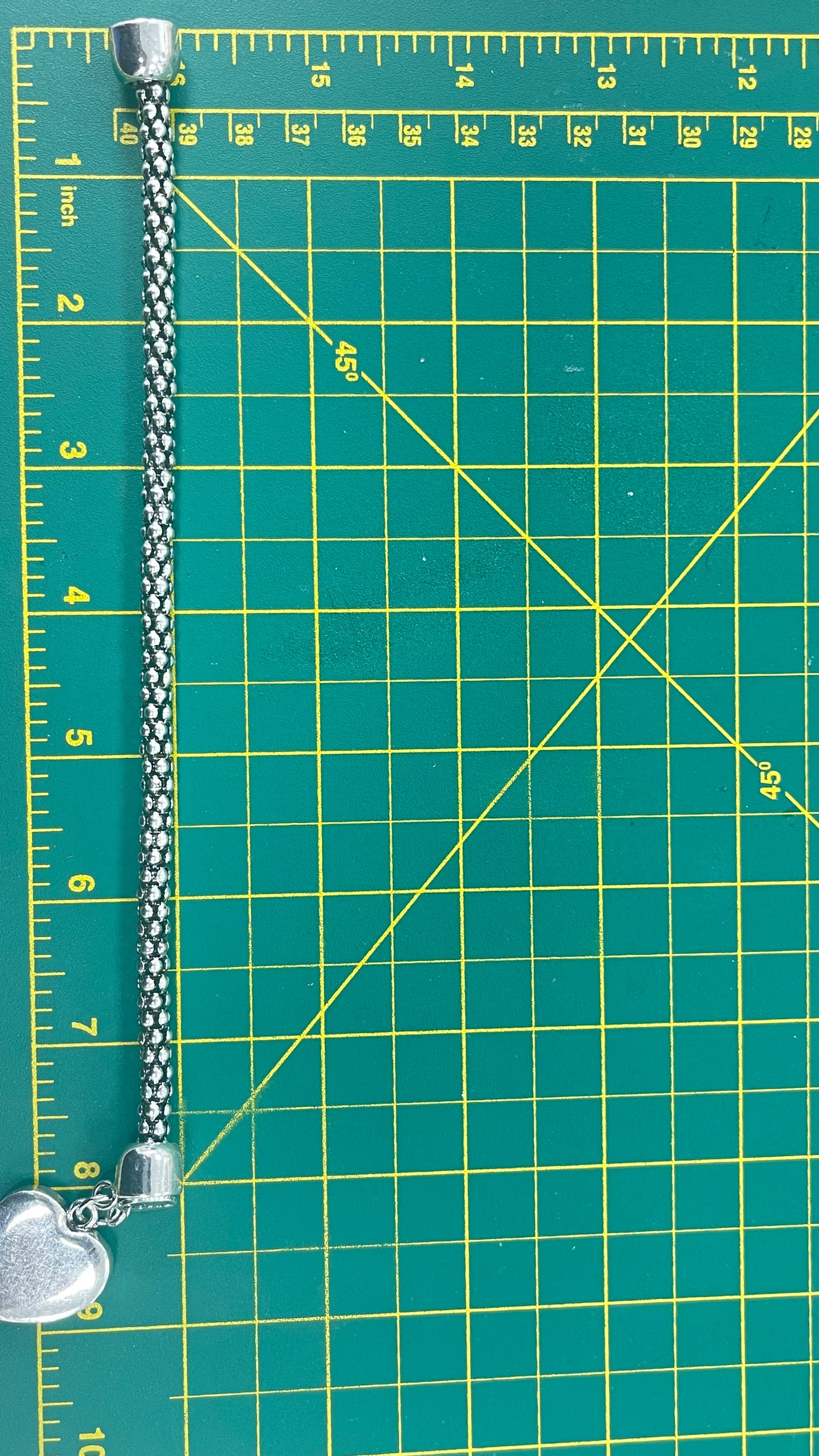 Silver Bracelet With Hanging Heart