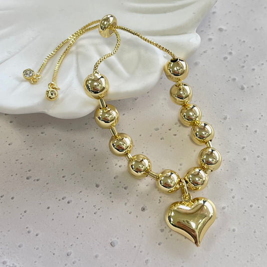 Mid Globe With Heart Gold Bracelet